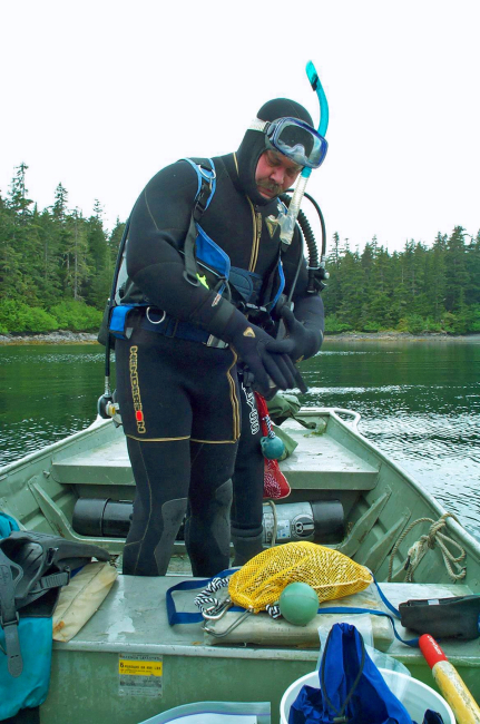Preparing for a SCUBA dive in cold water to retrieve a temperature probe