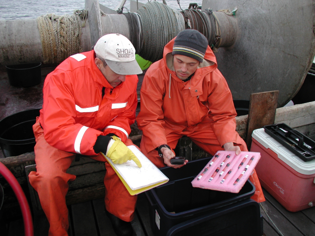 Scientist Phil Levin and colleague discuss sampling and tagging proceduresduring cruise to tag Puget Sound gill sharks