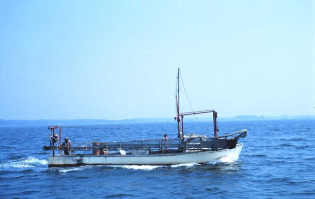 A Chesapeake Bay clam dredge boat underway