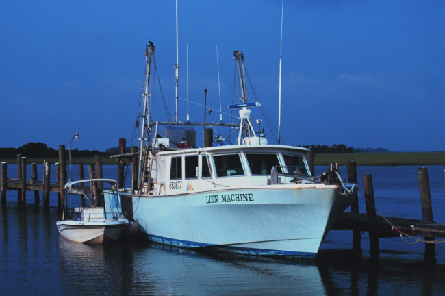 Humor in names - the F/V LIEN MACHINE tied up at Crosby's Fish & Shrimp Co