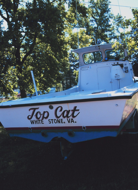 Small Chesapeake Bay waterman's boat on the blocks for maintenance