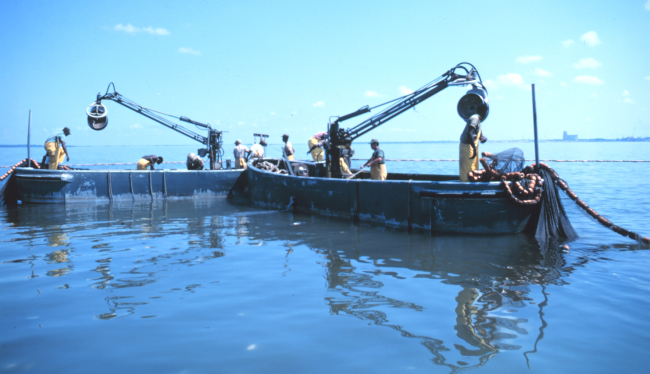 Menhaden fishing - beginning to set out the nets in purse seining operation