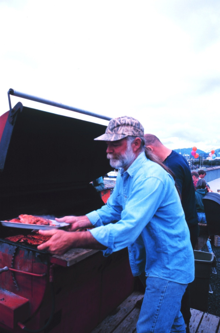 Grilling salmon at a community fish fry in support of the United Seiners Association
