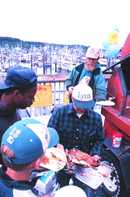 Time to eat the salmon at a community fish fry in support of the United Seiners Association