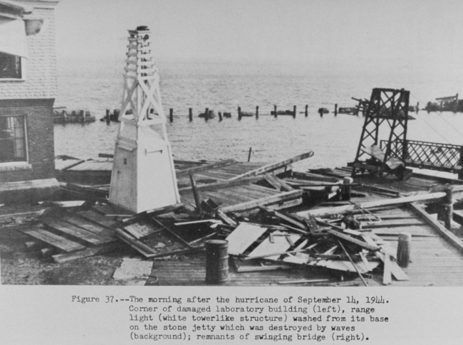The morning after the hurricane of September 14, 1944 showing damage to piersand navigation aid