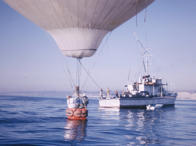 The YAQUI QUEEN, off La Jolla, either rescuing a downed hot air balloon orengaged in a bizarre attempt to use a balloon for observation purposes