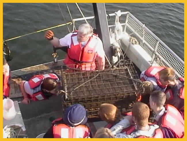 Students aboard the Catherine Moore school boat, a 56 foot research vessel
