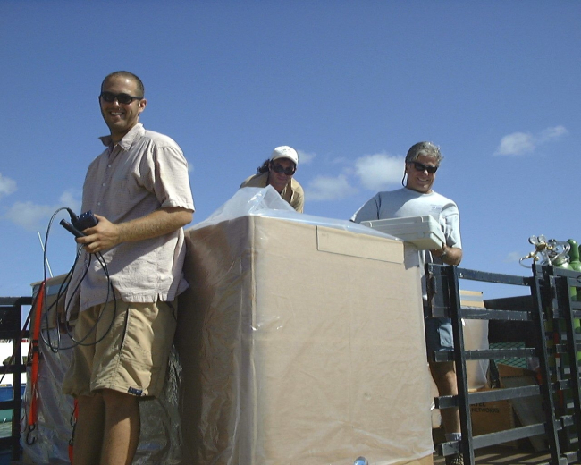 University of Miami Rosentiel School staff preparing cobia, Rachycentron canadumto Puerto Rico offshore cages
