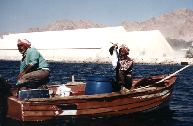 Native fishermen display catch