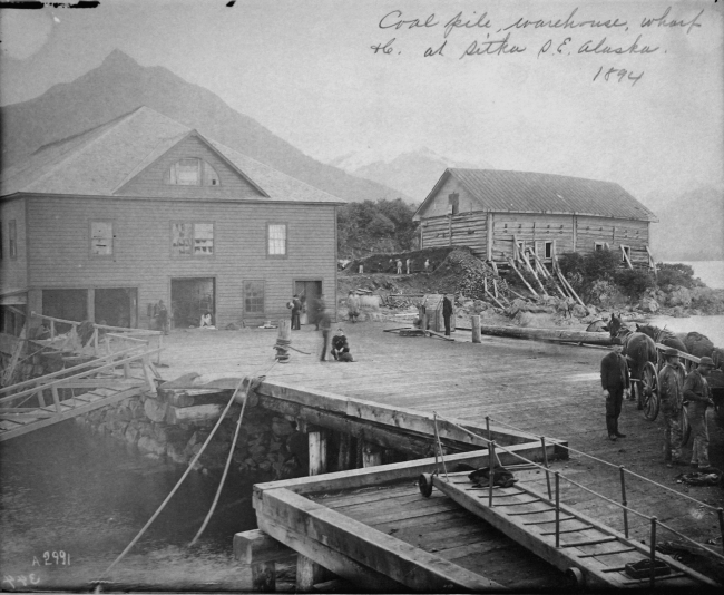 Coal pile, warehouse, wharf, etc