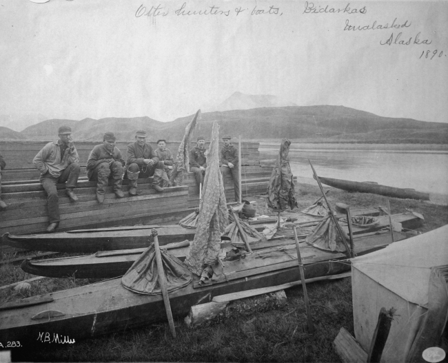 Otter hunters and boats, bidarkas, Unalaska, AK, 1890