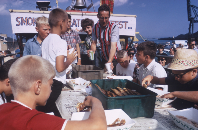 At the annual fish day at Port Washington, youngsters participate in a smoked-fish eating contest