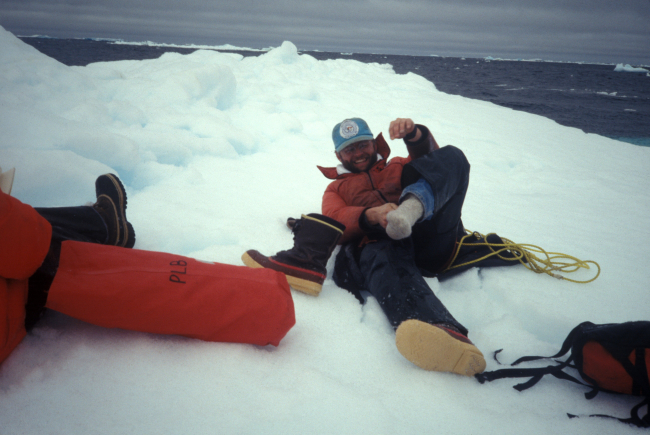 Wrestling with safety gear, South Shetland Islands, Antarctica