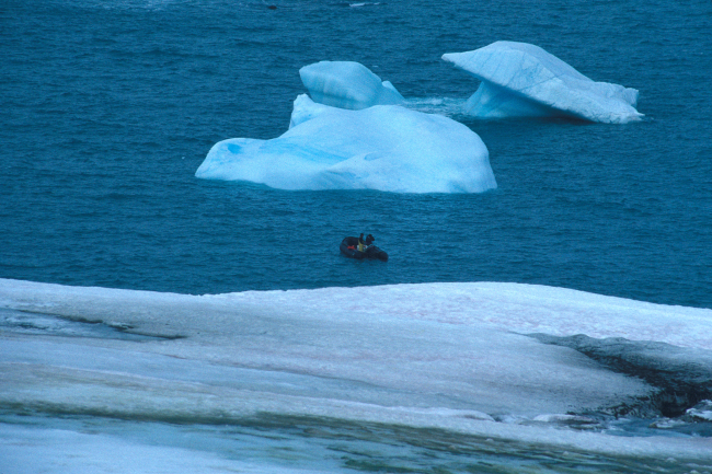 Navigating a Zodiac among small icebergs called growlers