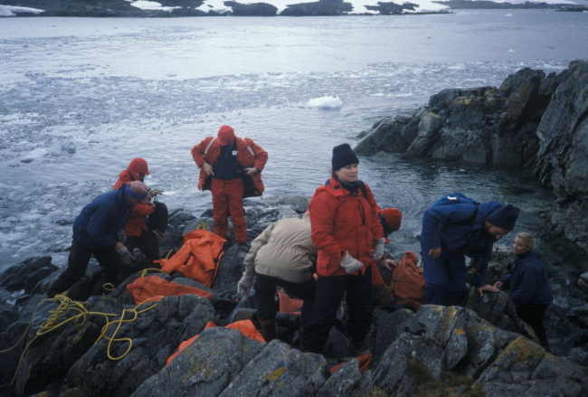 AMLR scientists on the rocky shores of King George Island