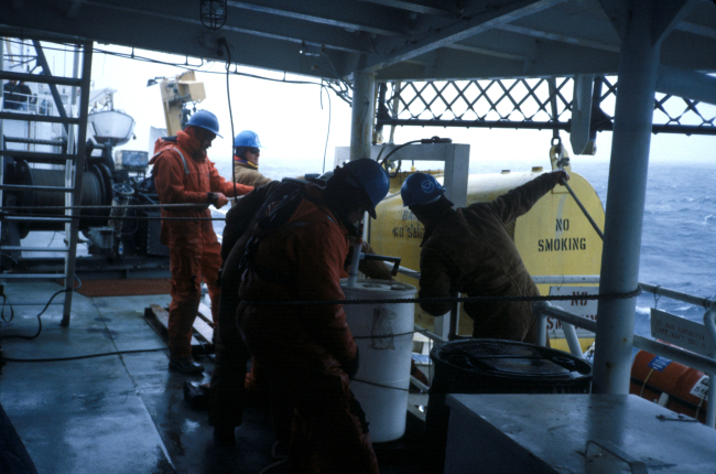 Preparing to deploy a piece of oceanographic equipment aboard the NOAAShip Surveyor
