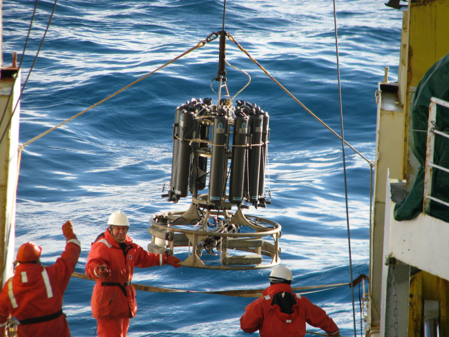 The crew of the R/V Yuzhmorgeologiya deploys a CTD from the stern