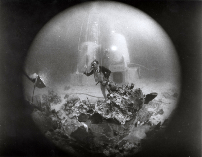 Scientist-aquanaut in the Tektite Program prepares for an extended stay awayfrom his General Electric designed and built habitat in Great Lameshur Bay, U