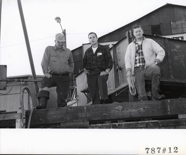 Master of the LEMES on left with employees of the Everett Fish Company