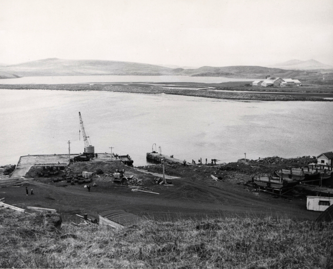 Village landing and marine ways with fur-seal byproducts plant in background