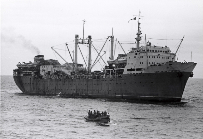 The Soviet factory ship KONSTANTIN SUKHANOV with picker boat