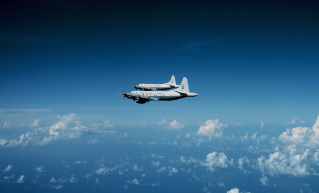 Both NOAA P-3's flying to a mission
