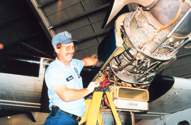 Kevin Rotteveel performing maintenance on Twin Otter