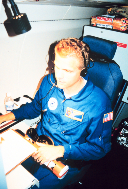 AOC Electronics Technician Chris Hornbrook flying on NOAA 49, the Gulfstream IV