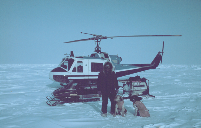 Brendan Kelley, University of Alaska, Fairbanks, conducting seal research on thefrozen Beaufort Sea north of Prudhoe