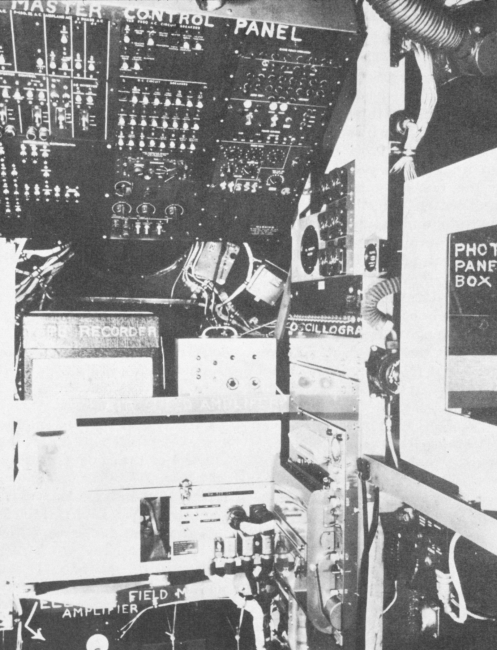 Technicians position in the B-50, an Air Force aircraft loaned to the WeatherBureau for hurricane research