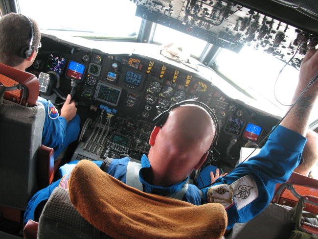 Pilots and flight engineer of NOAA WP-3D Orion flying into Hurricane Ike