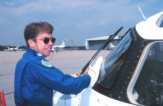 Lieutenant Mark Hickey taking care of details that make for safe flights onRockwell Turbo Commander N53RF