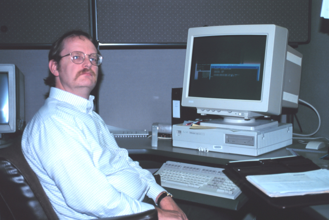 Mike Keltz, a computer programmer with the National Geodetic Program, at hiswork station