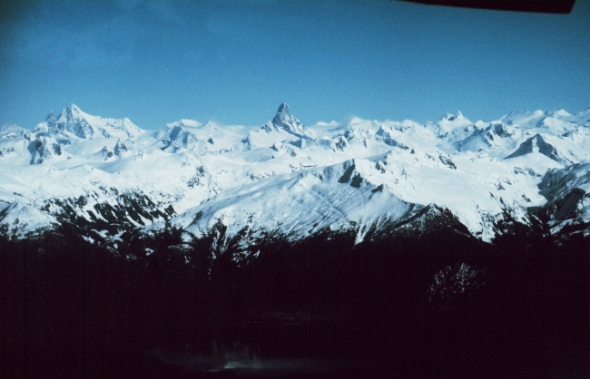 The Devil's Thumb in the center with Mount Burkett  to the left