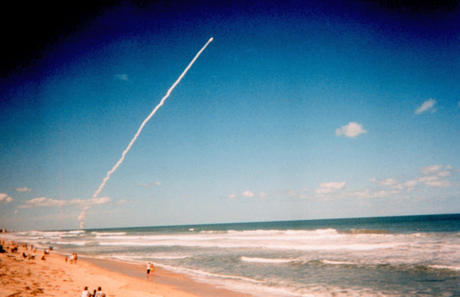 A space shuttle launch from Cape Canaveral provides a dramatic site forbeach-goers