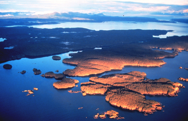 Late afternoon sun illuminates islands and mountains of Prince William Soundarea
