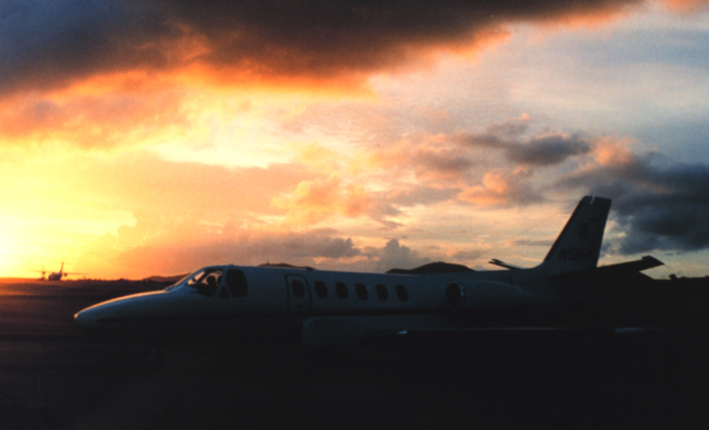 NOAA Cessna Citation II jet aircraft at sunset at Rohlsen International Airport