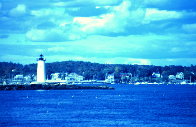 A view of the lighthouse guarding the harbor entrance
