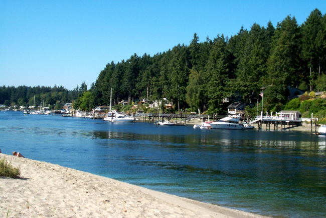 A view of private boat docks from one of the few sandy beach areas inthe Gig Harbor area