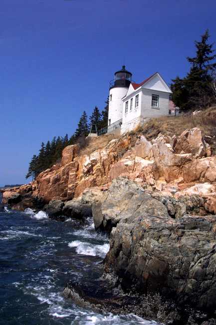 Bass Harbor Head Lighthouse from below and looking east at the shoreline