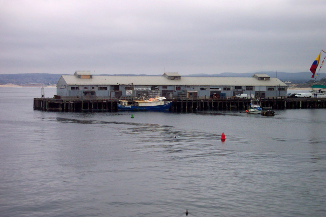 A scene reminiscent of a Steinbeck novel - the fishing vessel LUCKY tied up at a commercial wharf at Monterey