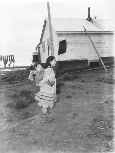 Eskimo girl and baby on Bering Sea Island