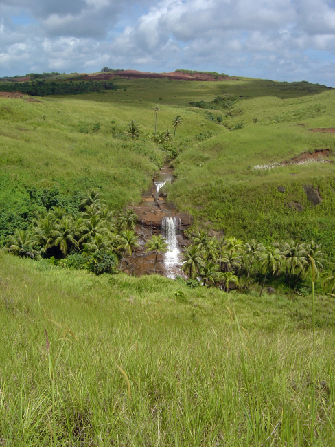 A little mountain stream flowing to the sea in the highlands of Guam
