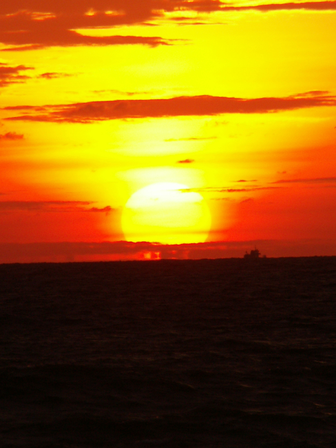 Hobe Sound sunrise with vessel on the horizon