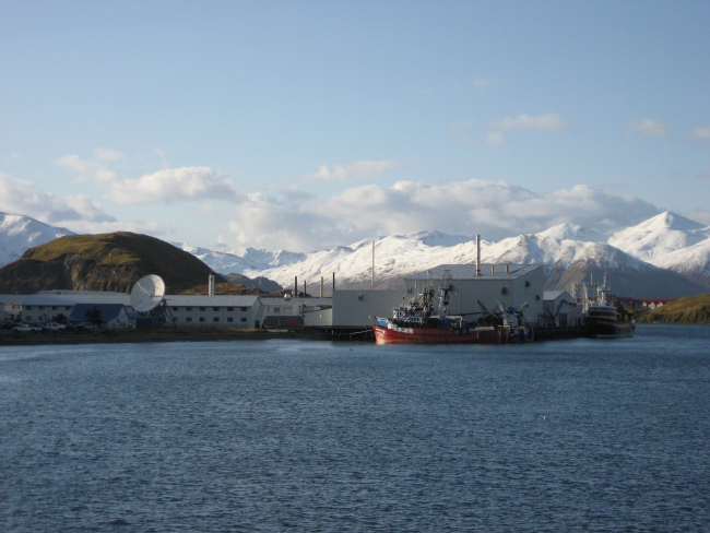 Fishing boats, processing plants, mountains and snow - Dutch Harbor