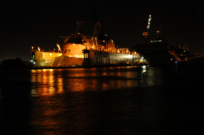 A Norfolk area shipyard seen at night