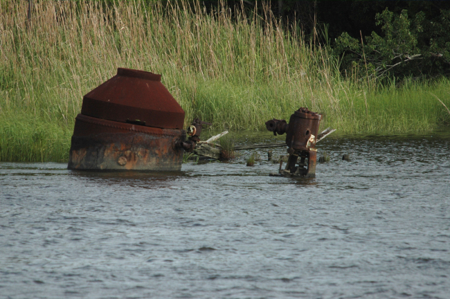 Rusting machinery in the Cape Fear River