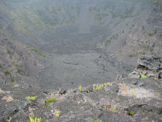 Recently active crater with sparse vegetation making a comeback