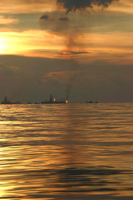 An oil recovery vessel flares gases during the summer 2010 oil spill