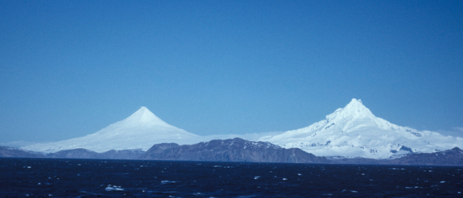 Magnificent view of Shishaldin and Isanotski volcanoes from offshore